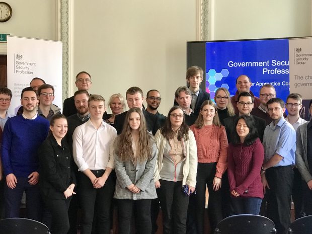 Cyber apprenticeship attendees gather for a group shot. 