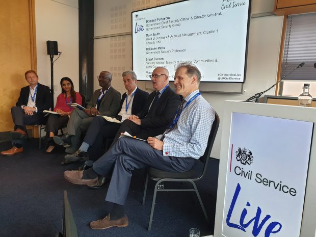 panel members sat around having discussion to audience